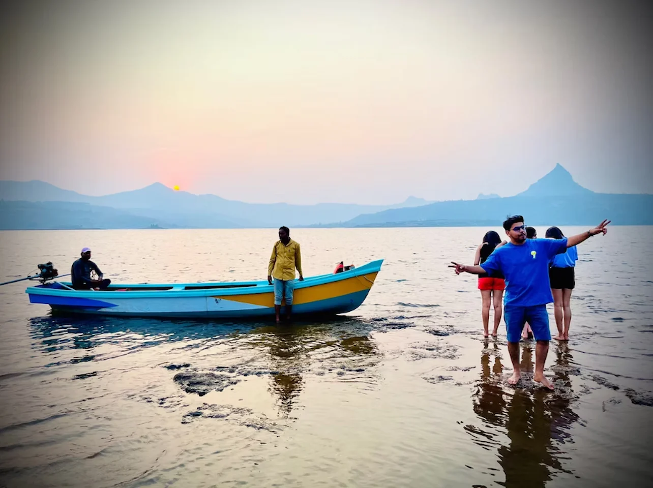 couple boating in pawna lake water